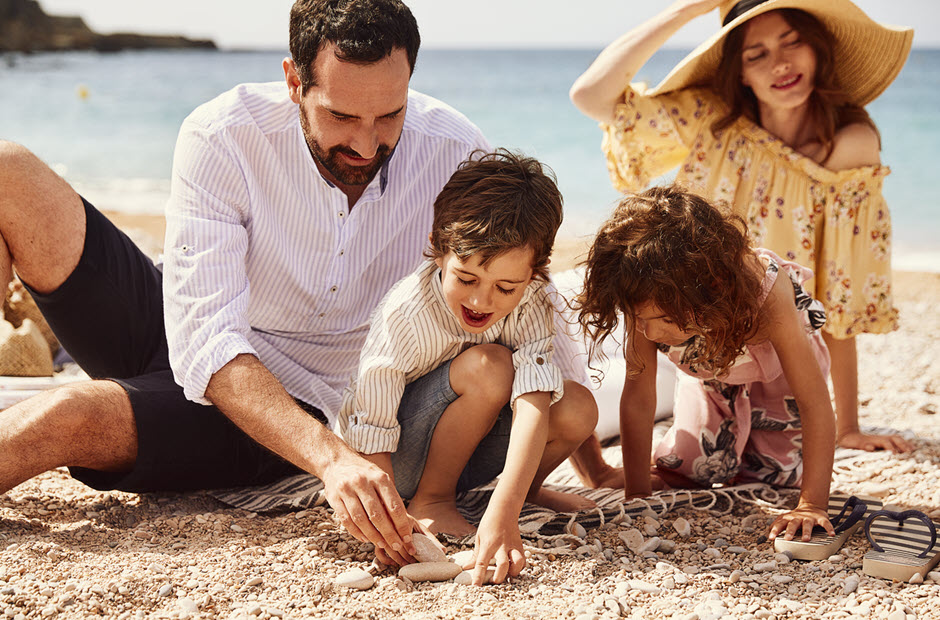 Family with children on the beach